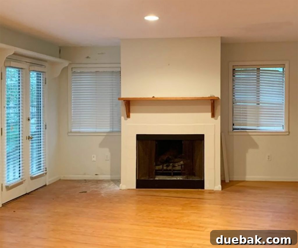 6 Clever Ways We Elevated Our Bedroom 16 Before photo of the original fireplace in the living room area before its bedroom conversion