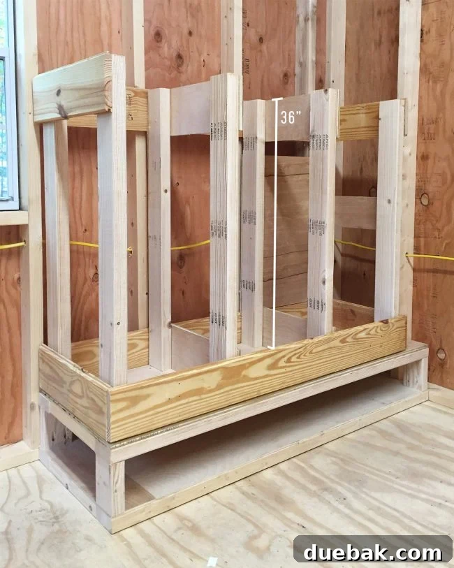 Adding 3-foot tall vertical dividers to the scrap wood organizer storage, supported by perimeter frames
