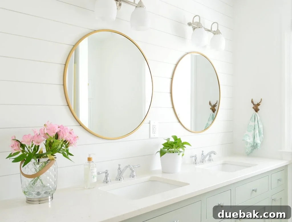 Bathroom With Extra White Shiplap Walls And Green Cabinets