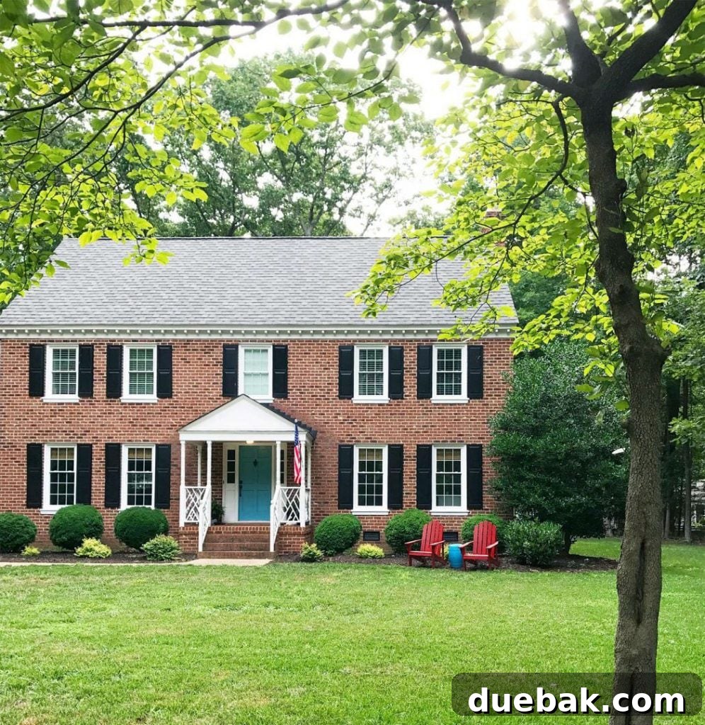 Traditional Brick Home Exterior With Sherwin Williams Snowbound Trim