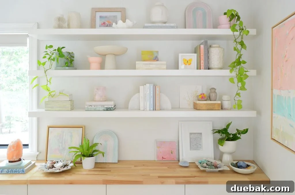 Rainbow Fluorite: Unlocking Its Energy and Purpose 6 Three Long Ikea Lack Floating Shelves Decorated With Plants Books And Objects, featuring various crystals and decor.