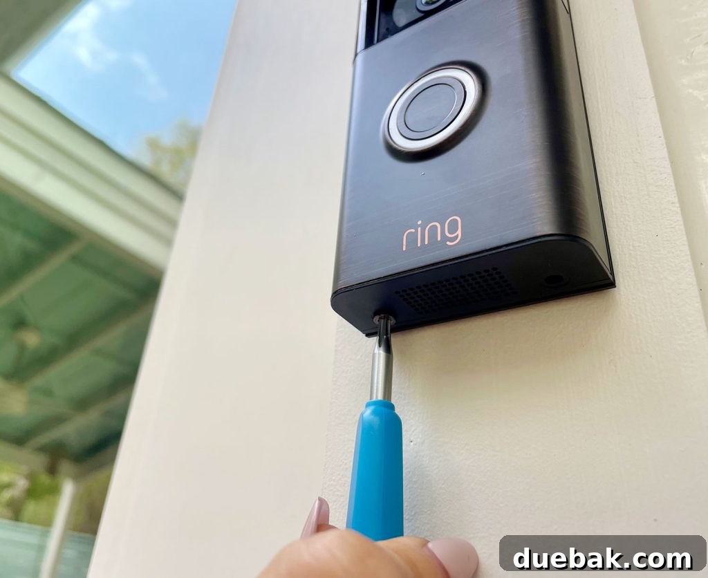Ring Doorbell Setup Simplified in Five Steps 12 Screwing the Ring Doorbell into its mount with special security screws to prevent theft