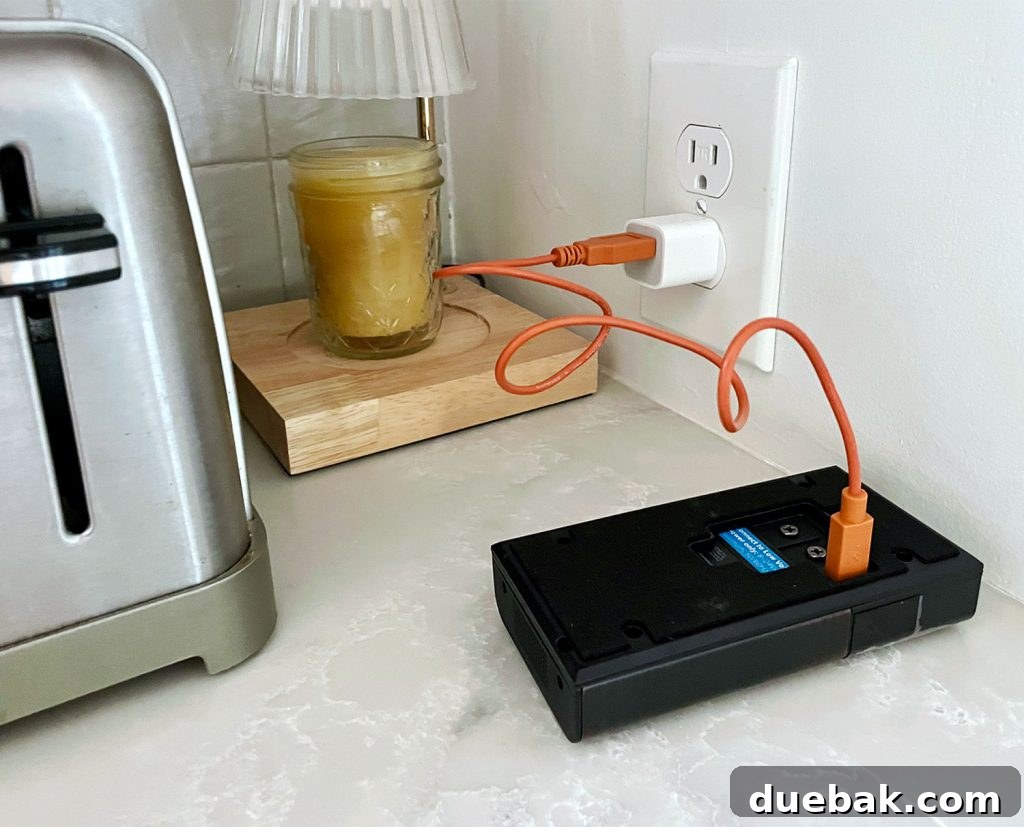 Ring Doorbell Setup Simplified in Five Steps 4 Ring Video Doorbell charging at an electrical outlet - Essential first step for battery-powered models