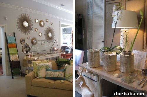 One Fish Two Fish Savannah: Sunburst Mirrors & Gilded Planters Wall of sunburst mirrors and gilded tree trunk planters at One Fish Two Fish, Savannah