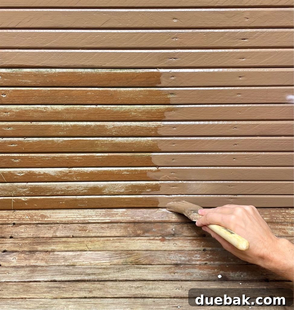 Elevating Your Outdoor Shower with Solid Stain 14 Applying Behr Solid Stain With Brush On Outdoor Shower