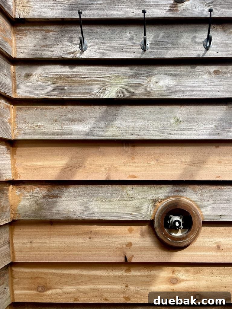 Elevating Your Outdoor Shower with Solid Stain 9 Outdoor Shower With Patches Of New Cedar Siding As Walls