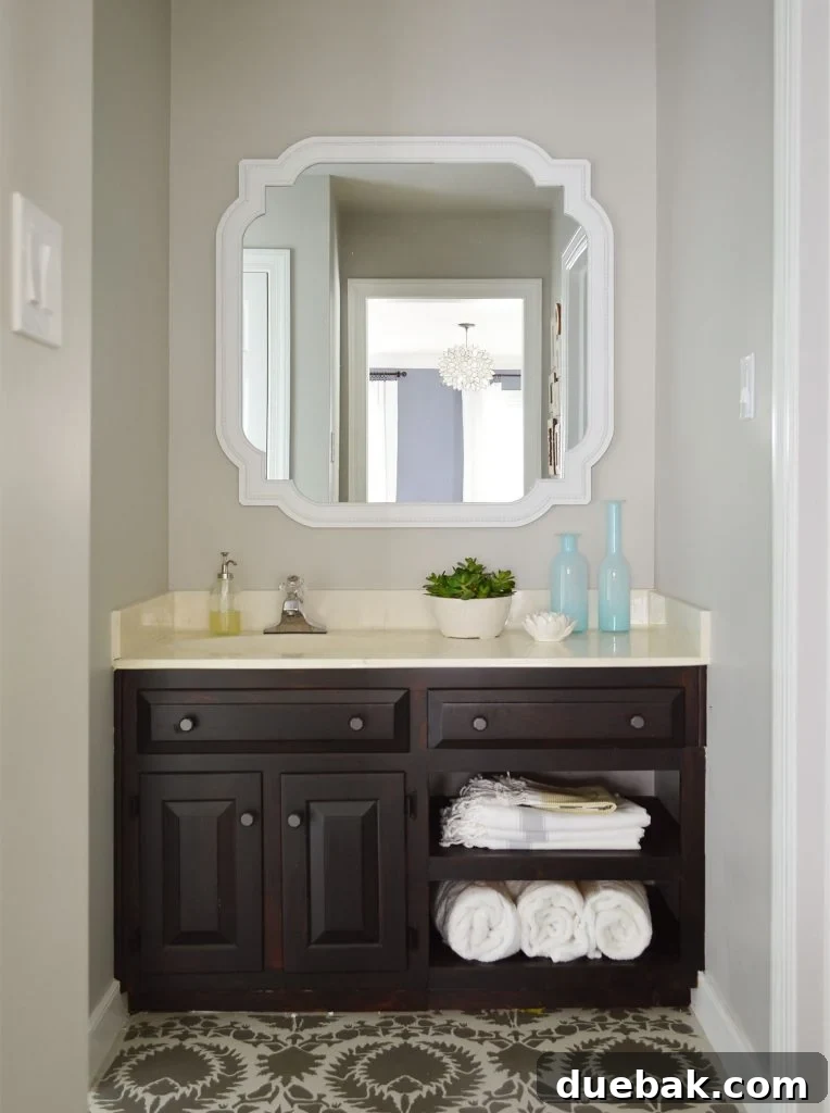 Bathroom Vanity Area With BM Revere Pewter Walls - Adding depth and warmth to a small space.