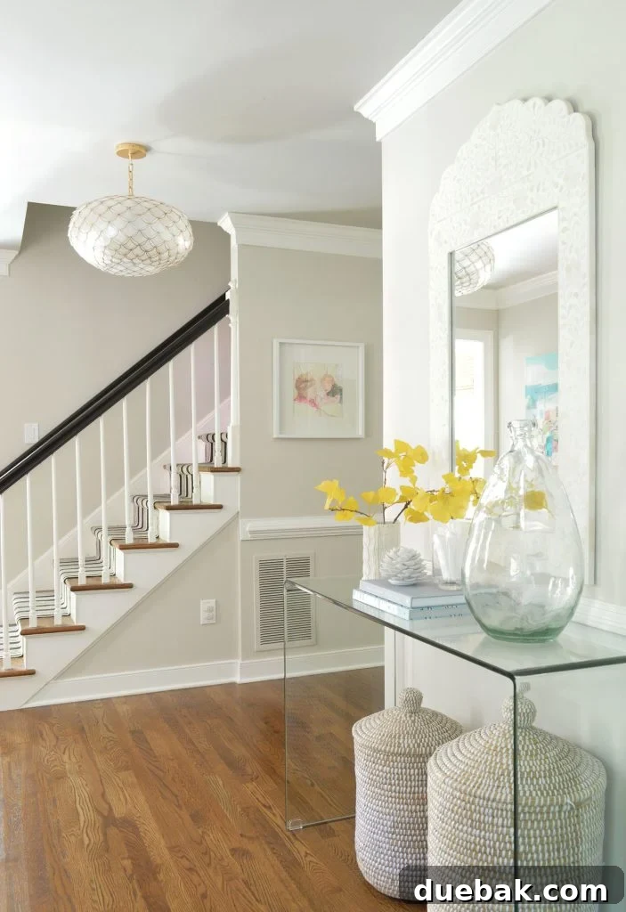 Greige Foyer With Revere Pewter Ceiling and Edgecomb Gray Walls - A sophisticated play on complementary neutrals.
