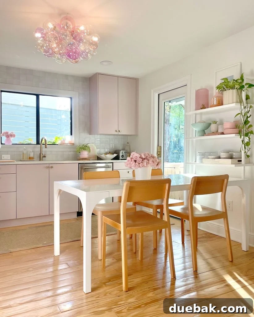 Our Cozy Kitchen-Living Nook 13 Modern White Breakfast Table In Kitchen With Mauve Cabinets And Bubble Glass Light Fixture