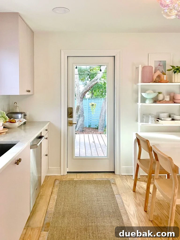Our Cozy Kitchen-Living Nook 5 Small Kitchen With Mauve Cabinets And Doorway To Porch