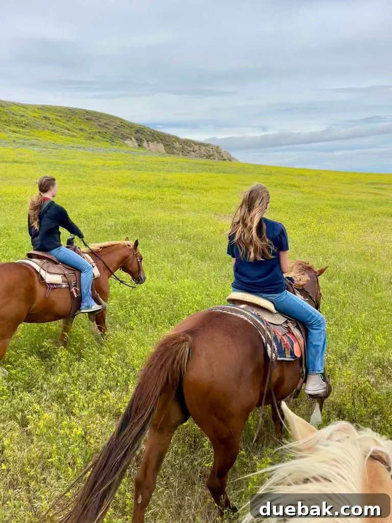 South Dakota Summer Odyssey 11 Two Girls Horseback Riding In Badlands South Dakota Among Sweet Clover