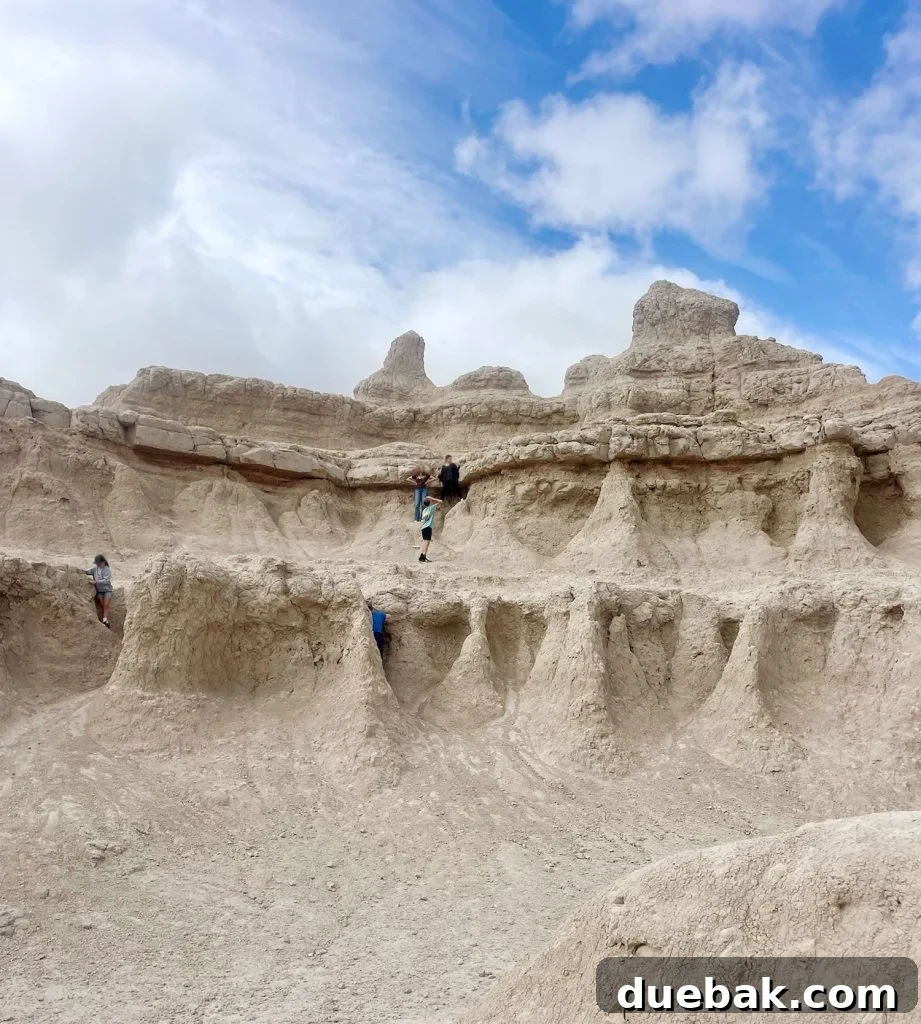 South Dakota Summer Odyssey 3 Kids Exploring Rock Formation In Badlands National Park