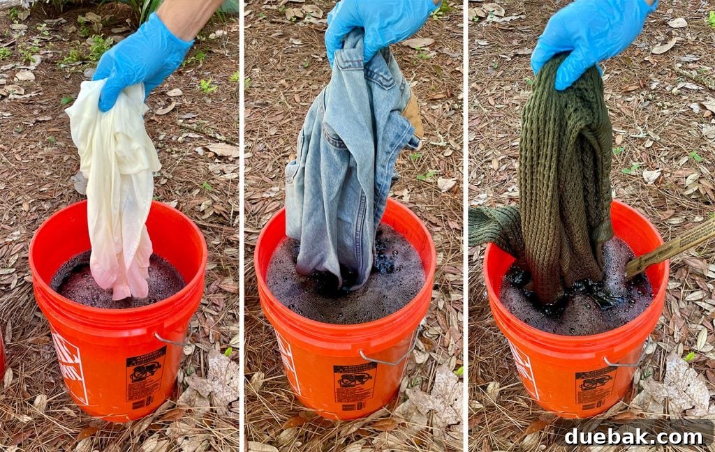 Mastering Fabric Dyeing at Home 11 Adding Three Pieces of Clothing To Black Rit Fabric Dye Bucket