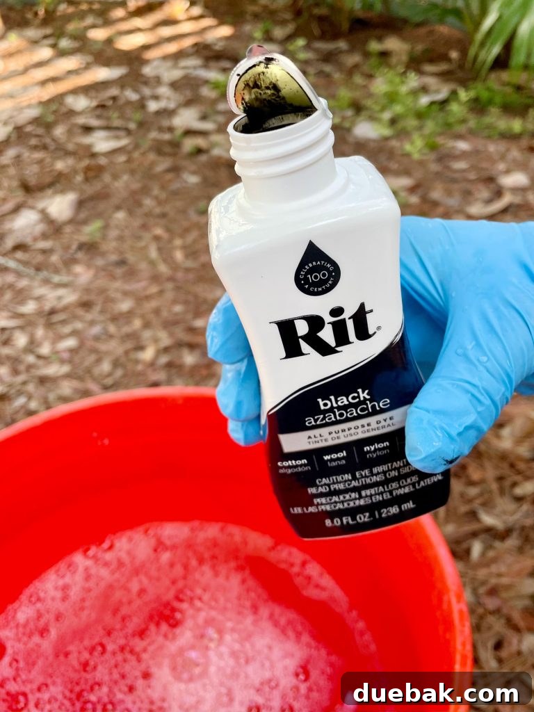Mastering Fabric Dyeing at Home 6 Bottle Of Black Rit Dye Over Bucket Of Hot Water