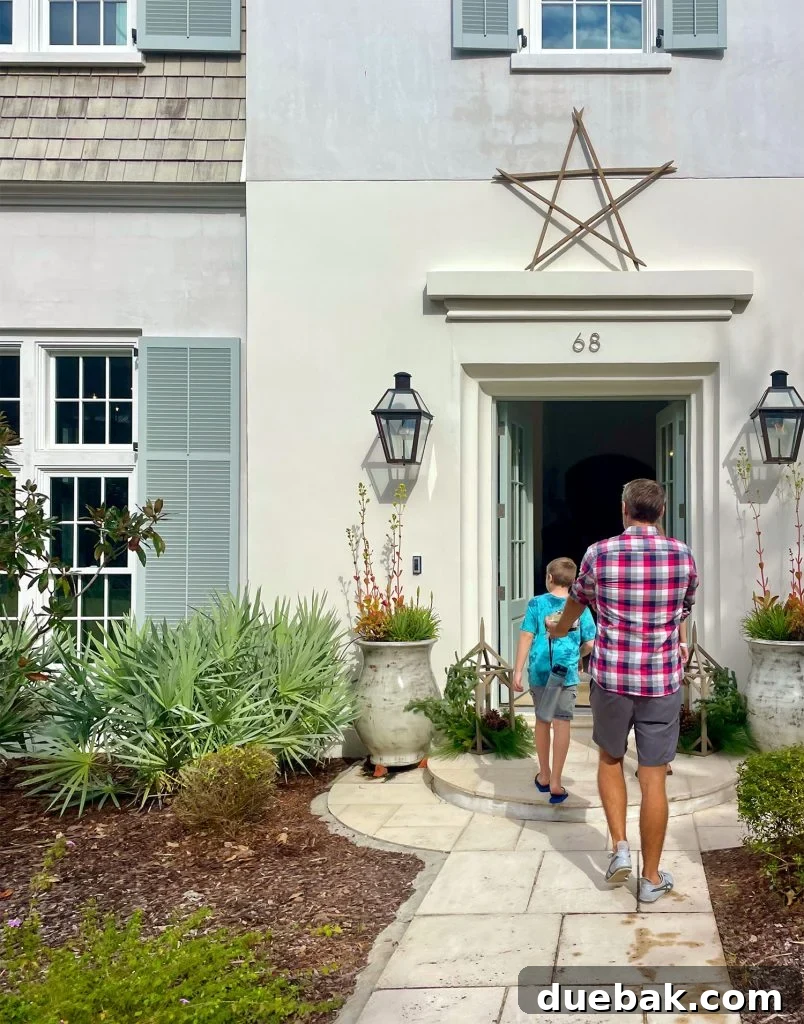 Father and son walking into a fancy open house, exploring spacious interiors
