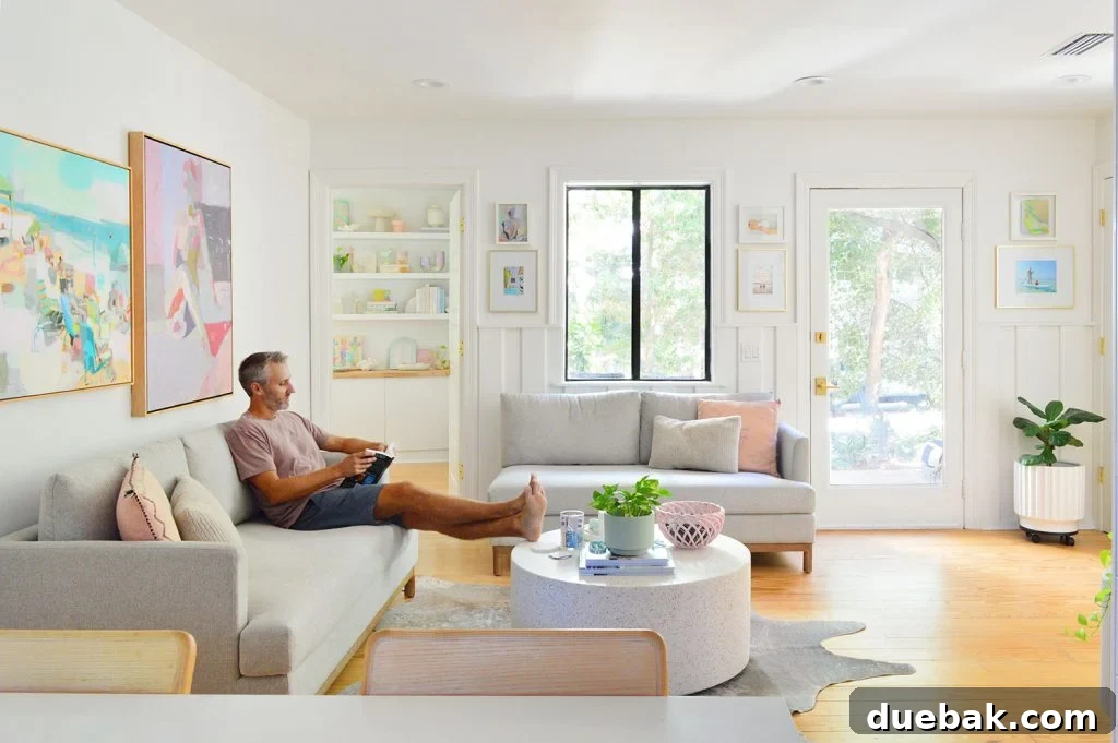 Cozy kitchen sitting area with two loveseats, promoting intimate family gatherings