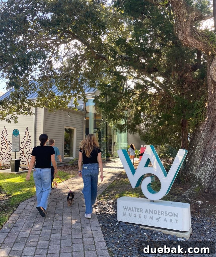 Family Walking into Walter Anderson Museum of Art In Ocean Springs Mississippi