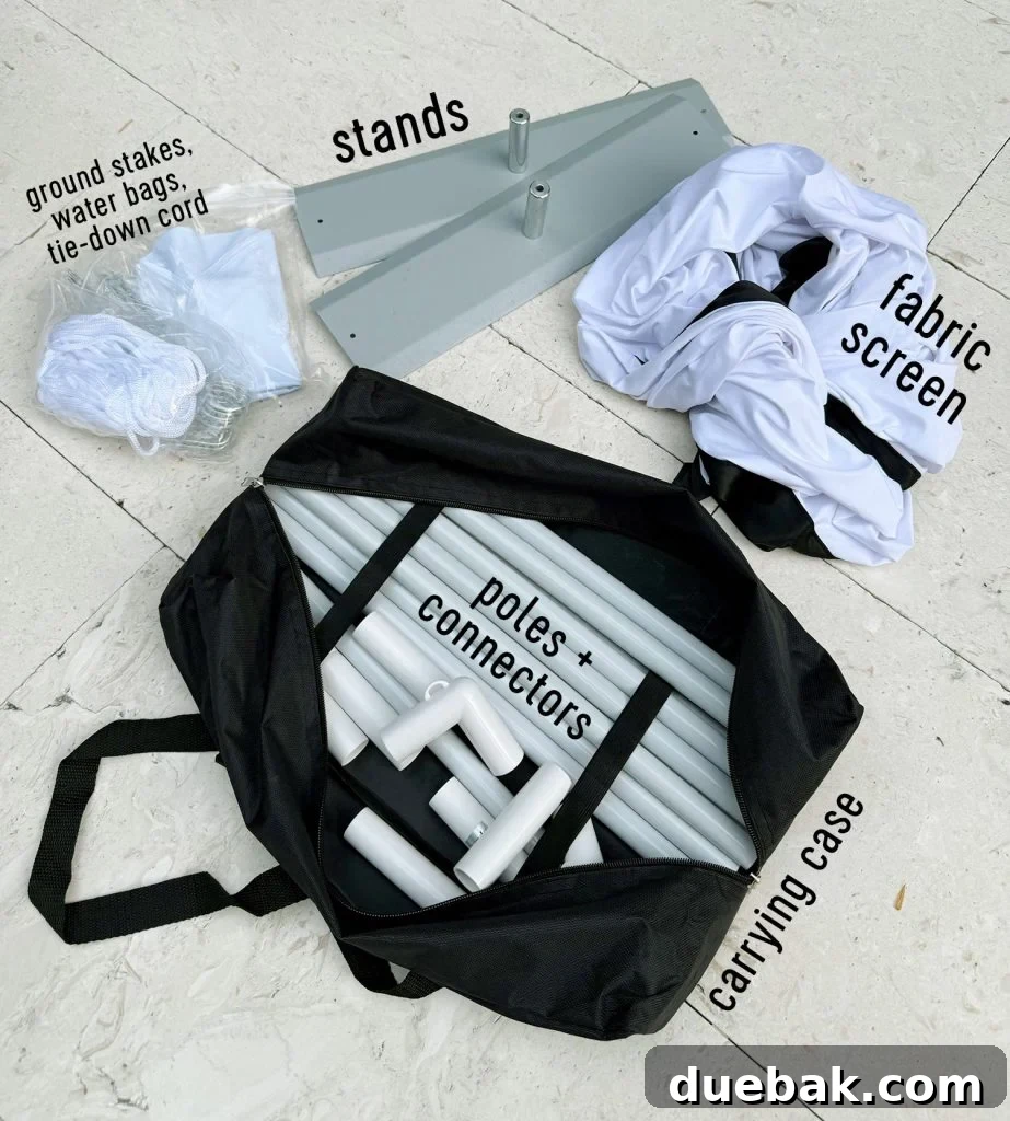 Supplies included in collapsible outdoor movie screen kit - showing stands, weights, rope, and the carrying bag for easy storage.