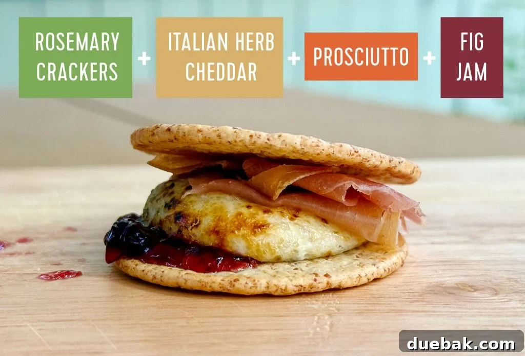 Upgraded Savory Smores With Rosemary Cracker Italian Herb Cheddar Proscuitto and Fig Jam