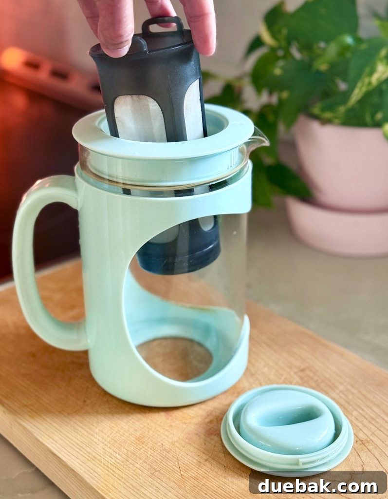 Brew Your Own Perfect Cold Brew 6 Addding Filter To Home Cold Brew Coffee Maker