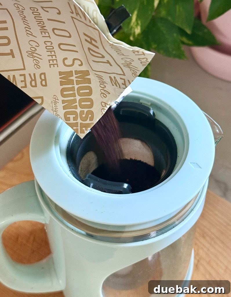 Brew Your Own Perfect Cold Brew 7 Adding Ground Coffee To Filter Of Cold Brew Maker