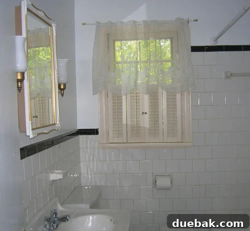 Unlocking Home 6 The original bathroom, showcasing its vintage charm.