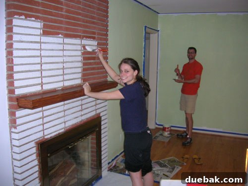 Unlocking Home 8 Sherry and her cousin painting the living room for the first time.