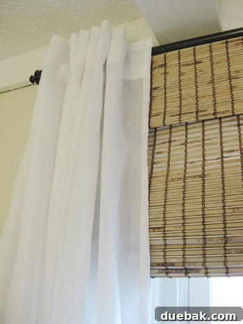 curtain-and-bamboo-roman-shade-detail-photo