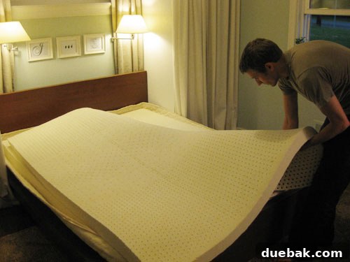 Our Organic Latex Mattress The Secret to Our Best Rest Yet 8 John adjusting the top soft latex layer