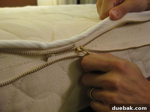 Our Organic Latex Mattress The Secret to Our Best Rest Yet 9 Zipping up the organic mattress cover
