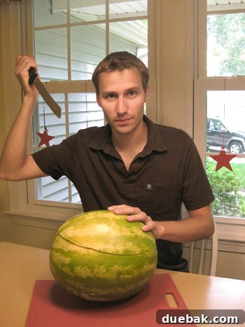 Cutting the top of a watermelon for a centerpiece