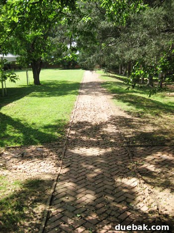 Wedding Week Two Our Brush with Forever 5 Brick walkway leading to grassy lawn at historic wedding venue