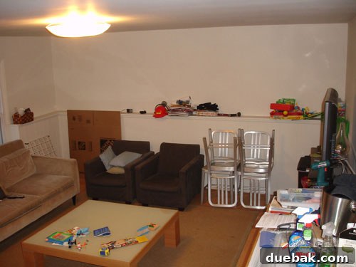 The Green Rug Effect: A Family Room Makeover 2 basement-den-makeover-before