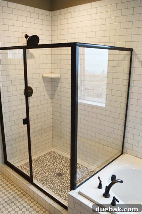 black-framed-shower-white-subway-tile