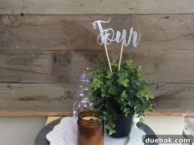 Finished marble table numbers in wedding decor setting