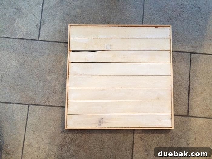 Whitewashing wood pallet sign for holiday decor
