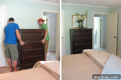 Boys moving a heavy dresser in the bedroom to improve floor plan