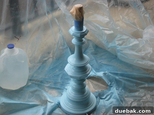Laura's newly painted lamp in a beautiful aqua satin finish, showcasing the smooth, even coverage.