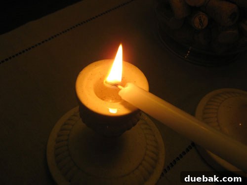 The Secret to Straight Candlesticks 8 Demonstration of dripping hot wax into a candlestick base to secure a taper candle