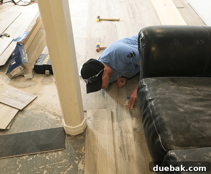 Transform Your Space with Vinyl Plank Flooring 13 cut-to-fit-vinyl-floors, demonstrating how to trim planks