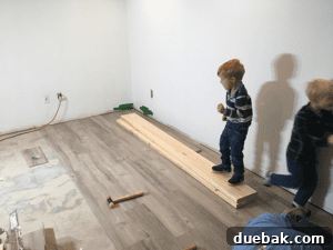 Transform Your Space with Vinyl Plank Flooring 17 Close-up of kids' feet on vinyl plank, highlighting comfort