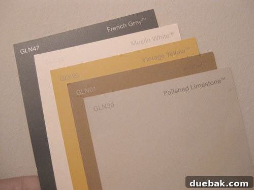 Crafting Your Perfect Nursery 3 Choosing paint colors for the nursery stripes, showing various paint swatches