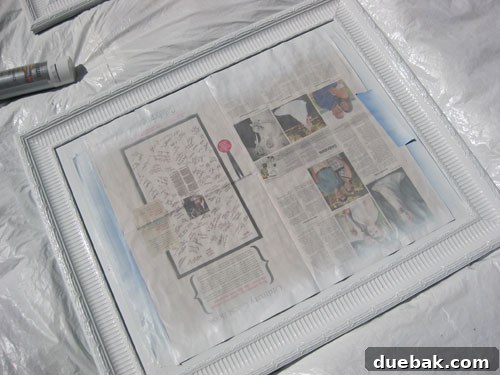 Transforming Walls: Painting and Hanging Mirror Windows 6 White-painted mirror frames drying