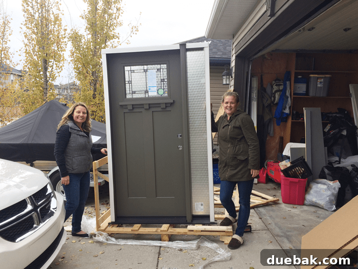 Elevate Your Entryway: Mastering Front Door Installation 8 Homeowner and Masonite representative inspecting the new front door unit.