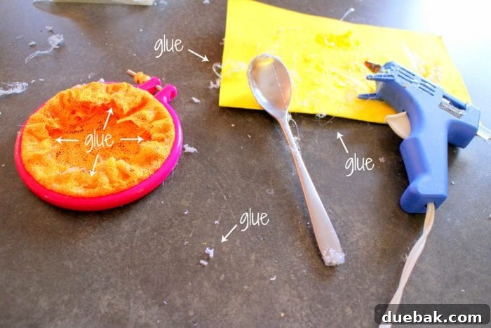 Detailed step-by-step image showing fabric being secured with hot glue inside an embroidery hoop, with a spoon used for pressing