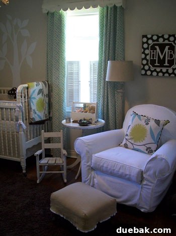 Blush Nursery Bliss 4 Close-up of a beautifully decorated nursery corner with crib, patterned bedding, and wall art
