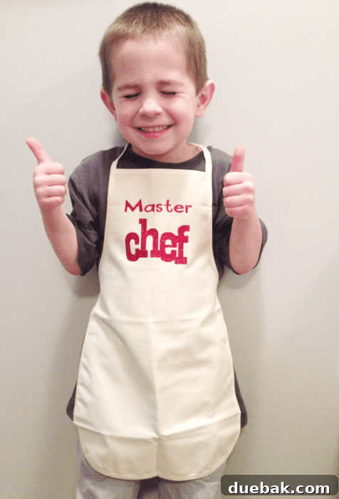 Collection of personalized kids' aprons with baking supplies
