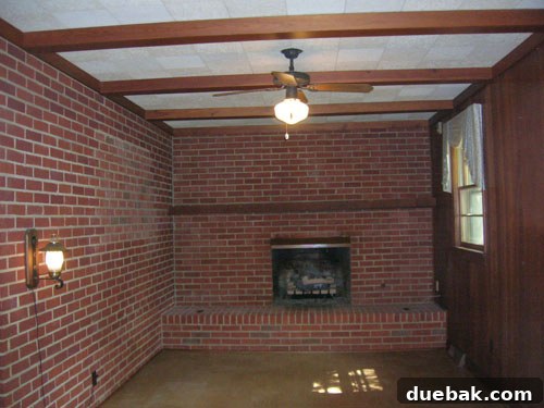 Old photo showing the exterior of the house, possibly before the carport was enclosed, a key part of its early DIY history.