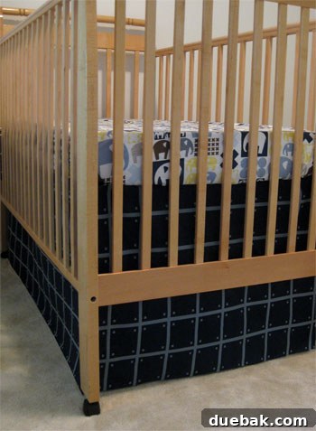 Modern geometric blue no-sew crib skirt for baby boy nursery
