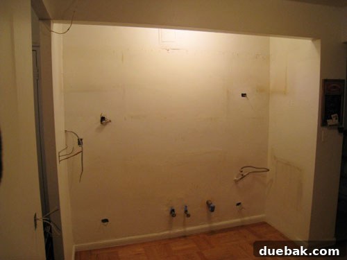 Gutted kitchen in a New York City apartment before remodel.
